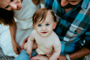 Portland Family Photographer, Baby is happy sitting with mom and dad