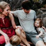 family of four laughing during family portrait session in Portland