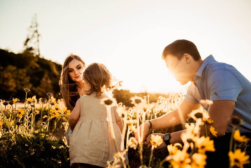 This dreamy family session with the winners of my giveaway in February took place in Rowena Crest. The wildflowers were in bloom and the wind was just perfect. Adventure family sessions are so fun because we get to go somewhere incredibly beautiful. It’s always worth the extra travel time to go to places like the Columbia River Gorge or The Oregon Coast. Your family photos should be a reflection of all the things you love and appreciate, so if you are a nature lover, this kind of location is for you! My inspiration for your family photos starts with getting to know you. That’s why I ask all the families I work with to fill out a questionnaire that tells me what their hopes and expectations are for their photos. Once I know what’s really important to you then I can start putting things together that I think will fit your family’s style. During our initial consultation I will discuss wardrobe with you. I don’t expect you to follow any particular style, I want it to feel true to you and your family. The most important thing is to coordinate colors and textures so that we can have the best possible results in your photos. The most important thing to know about working with me is that I value connection over perfection. I am looking to register real moments between you and your family so we won’t be running through a list of poses and prompts. Instead I will observe your family and let your love for each other shine. I would love to hear from you if you are looking for a family photographer in Oregon to capture beautiful memories of your family. Click here to contact me Why Choose Rowena Crest for Your Family Session? Rowena Crest it's a