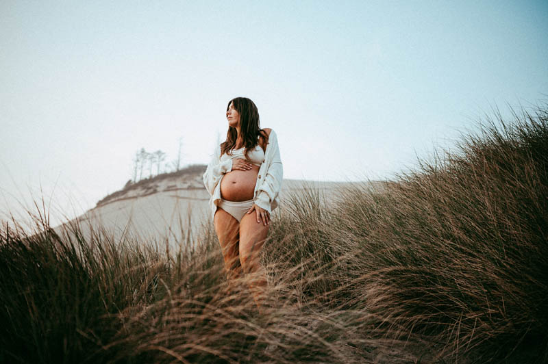 pregnant woman at the beach - prenatal yoga in portland